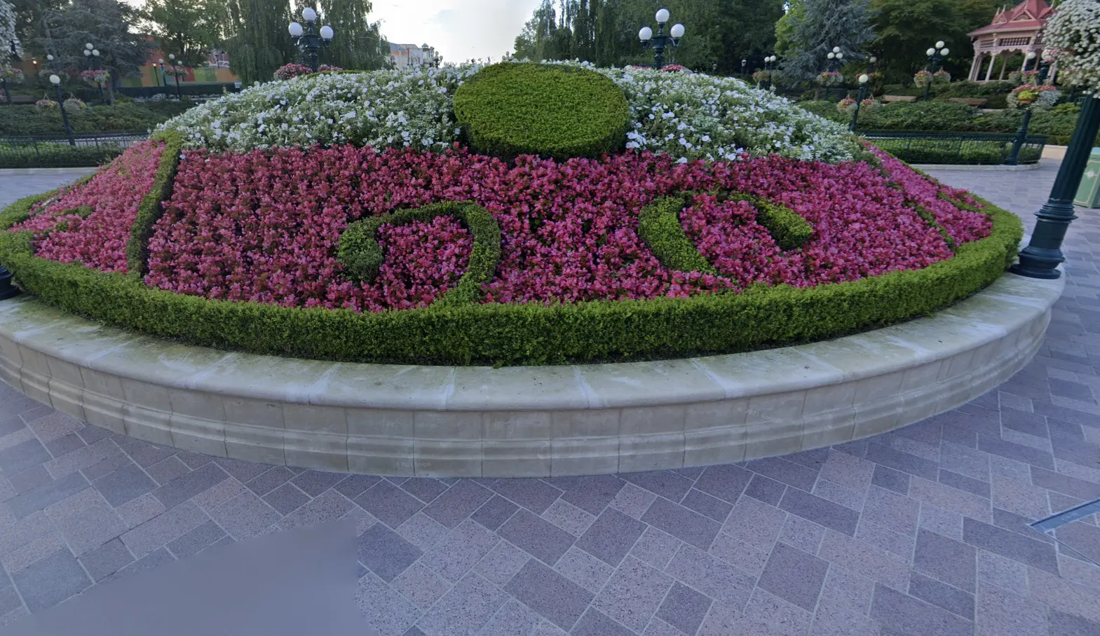 Concrete seat in front of Disneyland Paris front gate.